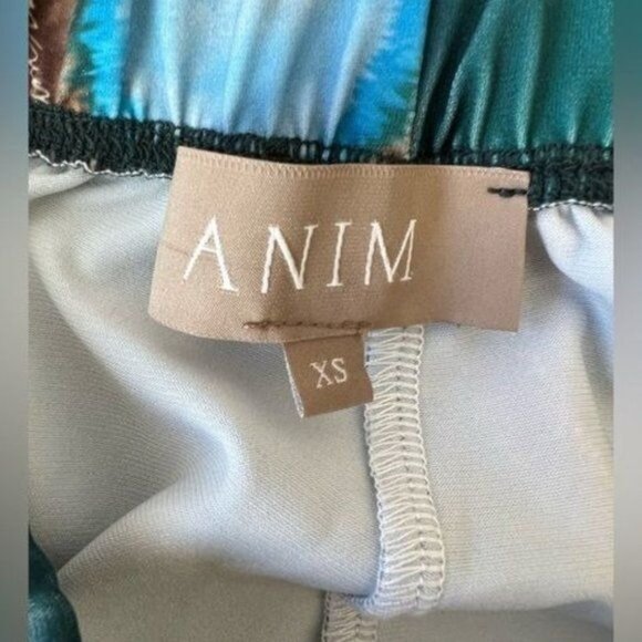 ANIM LIVING Ankle-Slit Flare Pants in Bizu - Picture 2 of 3